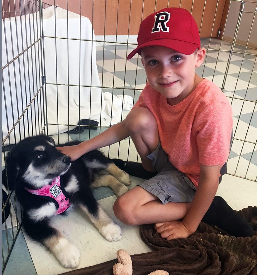 boy with puppy